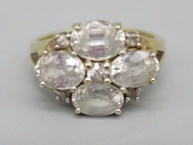 9ct yellow gold ring set with white sapphires, four oval cut and five brilliant cut white sapphires,