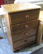 Pine top white finish side cabinet with three drawers above a shelf, and a pine chest of three
