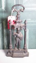 20th century cast iron door porter cast as a Knight in Gothic surround, H44cm