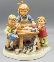 Hummel Goebel, Moments in Time Collection figural group 'Baker's Delight', limited edition 1202/