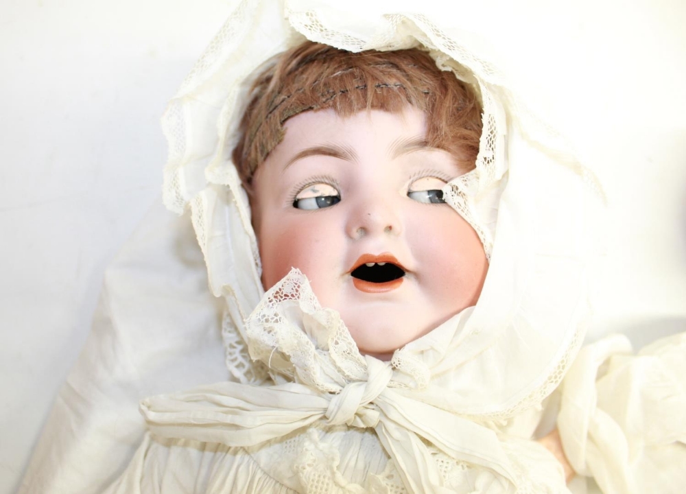 Two early 20th century bisque head baby dolls: crying doll marked Simon and Halbig 126, white gown - Image 2 of 3