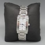 Ladies Tiffany & Co. chrome quartz wristwatch on matching bracelet, signed stepped white Arabic