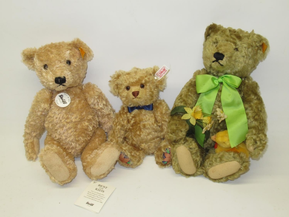 Steiff teddy bears: 'Dylan' with flowers and duckling, H32cm, 'Elmar', H30cm, and a limited