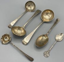 Pair of Victorian silver sauce ladles bearing coat of arms, by John Aldwinckle & Thomas Slater,