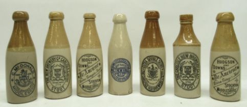 Collection of early 20th century stoneware ginger beer and stout bottles, predominantly North East