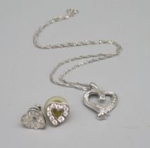 9ct white gold heart pendant on chain necklace, set with diamonds, stamped 375, 4.9g and a pair of