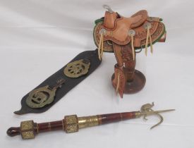 2 Chipperfields elephant brasses , Circus ceremonial elephant prodder and a small leather saddle