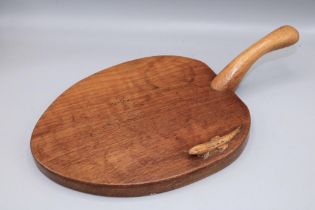 Derek Lizardman Slater of Crayke, an oak bread board with signature lizard, L35cm