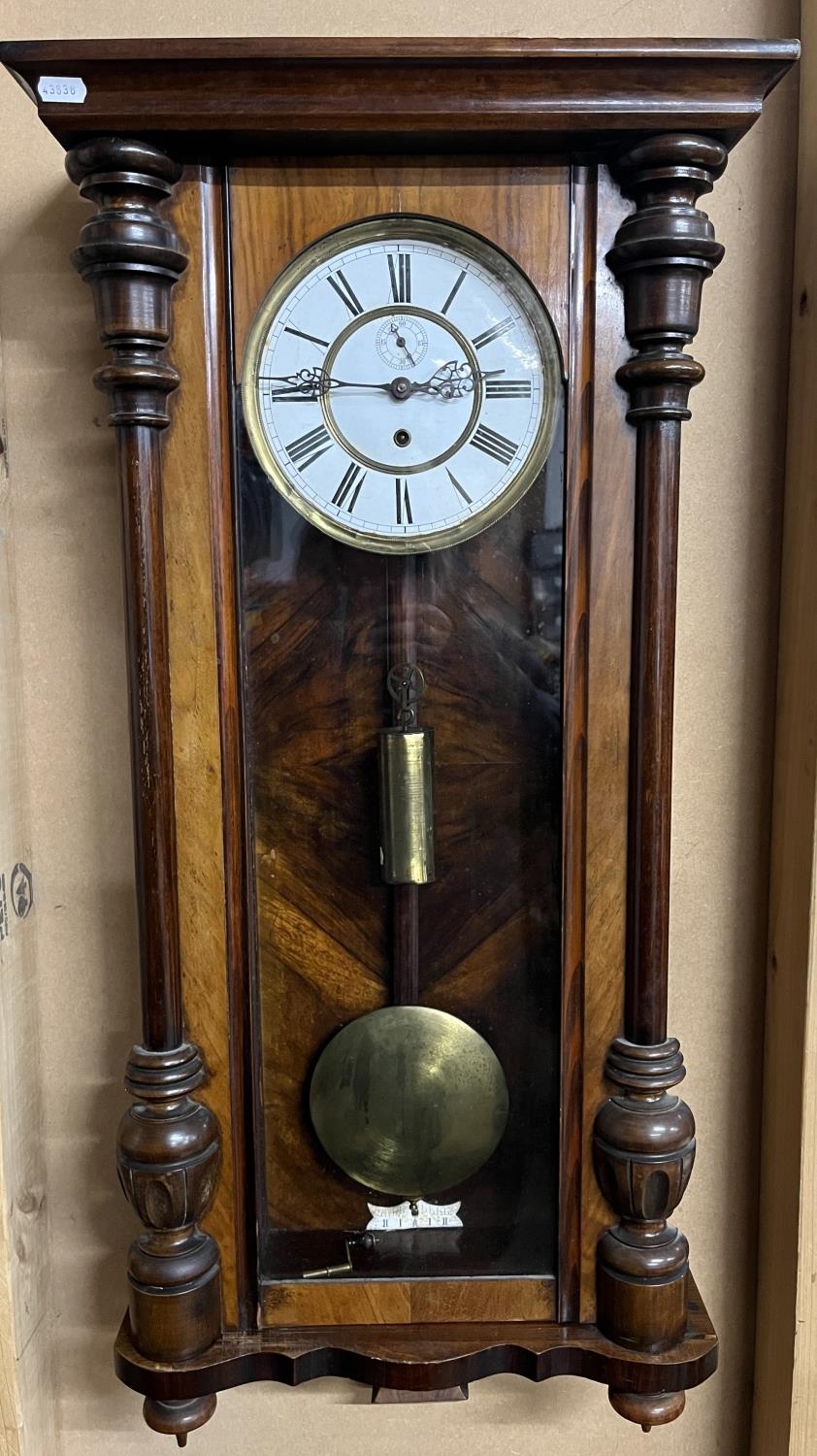 Early C20th continental walnut Vienna wall clock, full length glazed door enclosing 7 1/2" stepped