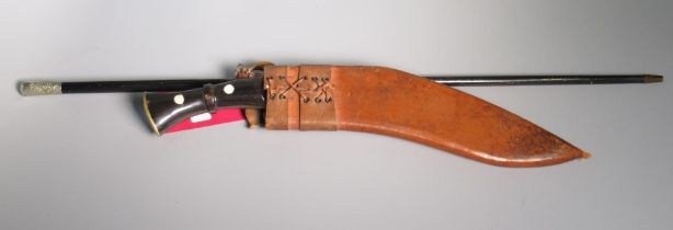 20th century Kukri knife, steel blade with polished horn grip, in leather sheath, L43cm and an