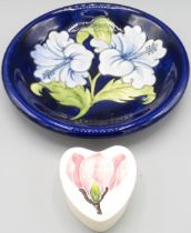 Moorcroft Pottery: 'Magnolia Flowers' pattern heart-shaped trinket box, pink flower on cream ground,