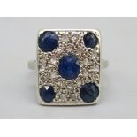 9ct white gold sapphire and diamond ring, the rectangular face set with central oval cut sapphire,