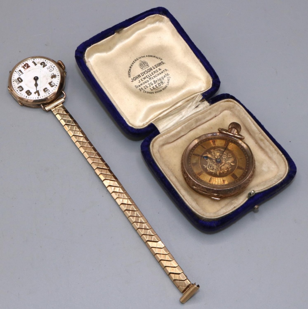 Swiss gold keyless pin set fob watch, engraved gold tone dial with Roman chapter ring, bright cut