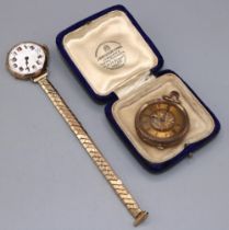 Swiss gold keyless pin set fob watch, engraved gold tone dial with Roman chapter ring, bright cut