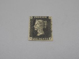 Victorian Penny Black stamp, with post mark, corners marked 'A F'