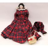Reproduction 19th century style porcelain head doll, moulded and black painted hair, tartan costume,