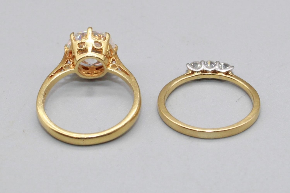 18ct yellow gold ring set with large clear stone, stamped 18, size J1/2, 3.6g, and a yellow metal - Image 3 of 3