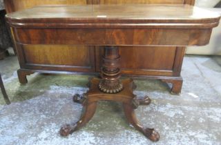 Regency mahogany tea table, folding top on vase turned column and platform base with four paw