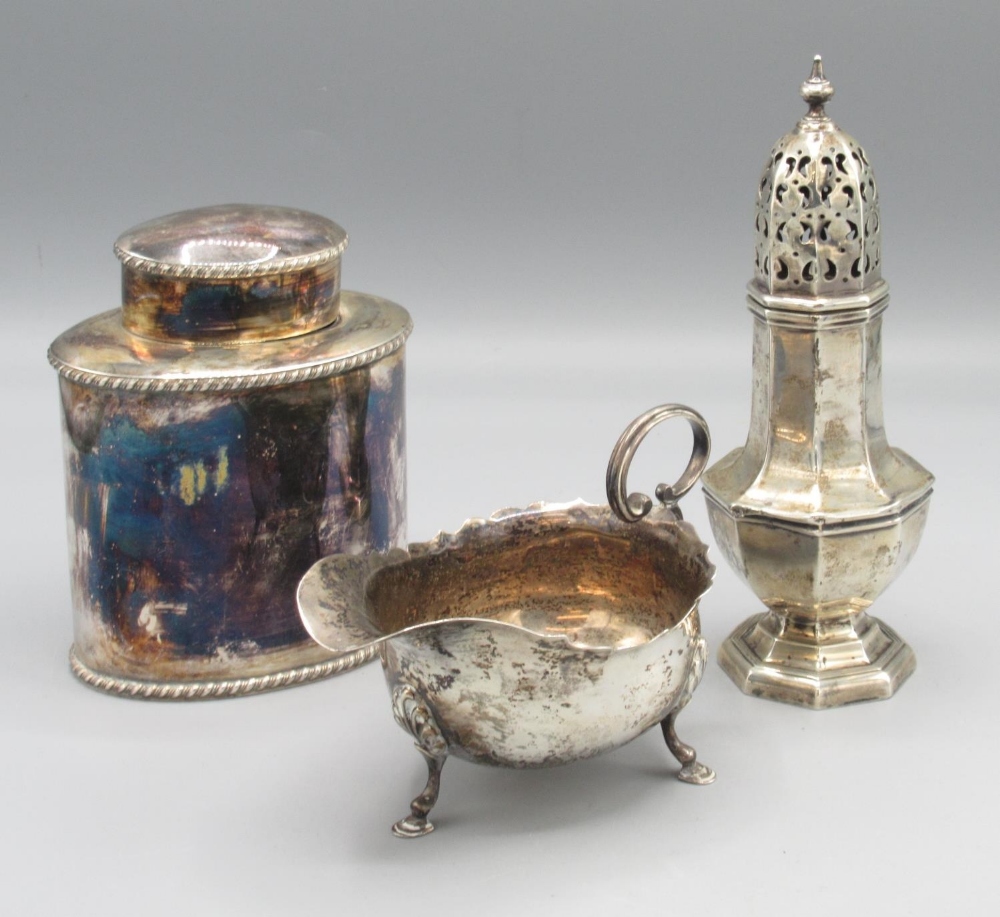 Edwardian silver tea caddy by Atkin Brothers, Sheffield, 1901, an Edwardian silver sauce boat on