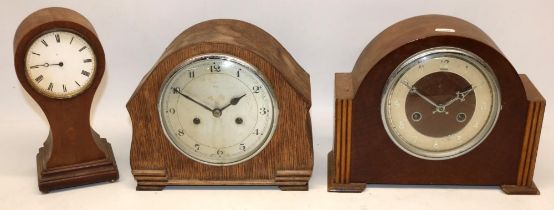 Enfield oak mantel clock, chrome bezel enclosing signed silvered dial, signed two train movement