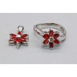 18ct white gold necklace set with diamond and ruby floral cluster ring, size M, and matching