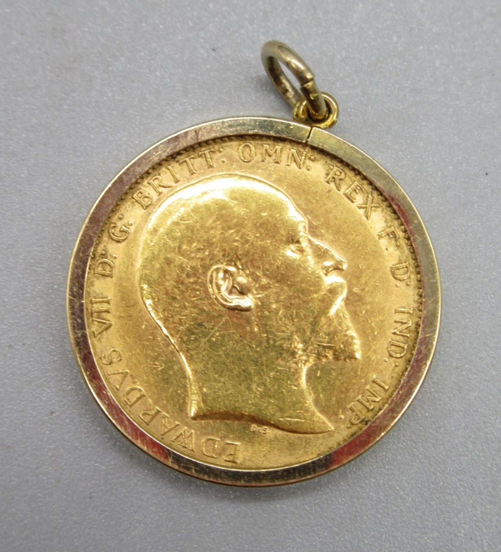 Edw.VII 1910 sovereign in 9ct yellow gold pendant mount, stamped 375, 9.2g