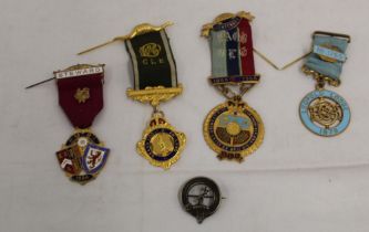 A small collection of masonic badges and medals or various styles and eras.