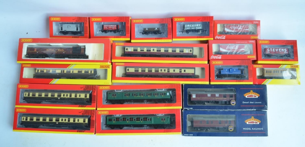 Collection of boxed OO gauge passenger coach and goods wagons from Hornby and Bachmann to include