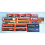 Collection of boxed OO gauge passenger coach and goods wagons from Hornby and Bachmann to include