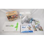 Nintendo Wii with original box, Wii Family Trainer by Bandai, Wii Fit, 6 in 1 sports pack for Wii