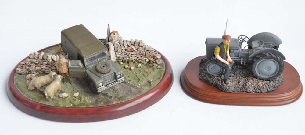 Two well presented farming related dioramas to include resin/ceramic grey tractor with resting