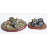 Two well presented farming related dioramas to include resin/ceramic grey tractor with resting