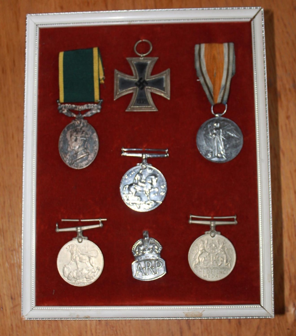 Framed collection of Medals. Victory Medal, 1914-18 War Medal, Territorial Army For Efficient