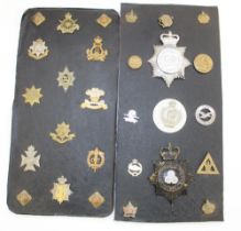 Eight Cards containing a collection of military and police medals and shoulder titles. To include
