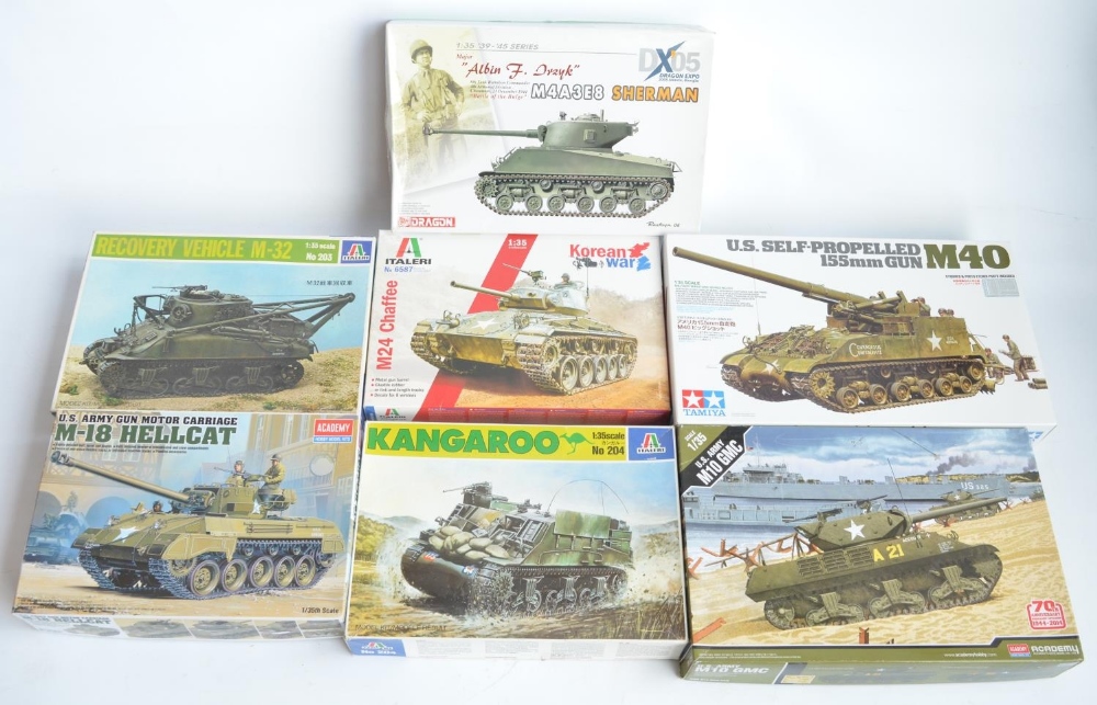 Seven unstarted 1/35 scale WWII and Korean War US armour plastic model kits from Tamiya, Dragon,