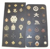 Eight cards containing a selection of metal military badges. To include Royal Navy burial badge, The