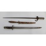 Lee-Enfield 1907 pattern bayonet. French model 1886 Lebel Bayonet. Tribal knife with wooden handle