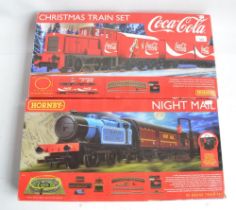 Two Hornby OO gauge boxed train sets to include R1233 Christmas Train Set (contents in mint