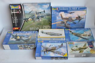 Seven unbuilt 1/32 scale WWII era plastic model kits to include Revell limited edition Classics