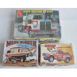 Three unbuilt 1/25 scale plastic model vehicles to include rare and long since discontinued late