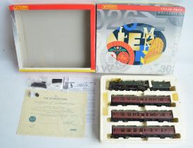 Two limited edition Hornby OO gauge boxed train pack sets to include R2660M 'The Norfolkman' BR 4-