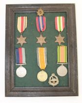 Framed collection of Medals. Africa Star, 1939-45 Star, Italy Star, 1939-45 Defence Medal, War