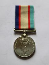 Australian Service Medal. To N223473 L.M. Levy.