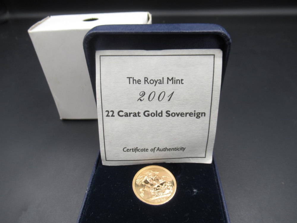 The Royal Mint Elizabeth II 2001 22 Carat Gold Sovereign, with COA in a Westminster coin box - Image 2 of 5