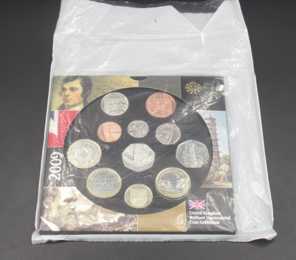 A United Kingdom Royal Mint brilliant uncirculated 2009 coin year set to include the Kew Garden