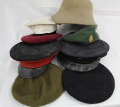 A collection of hats and berets from all services and different eras.