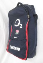 Collection of assorted Rugby related clothing to inc. a England 02 suitcase, rucksack and travel