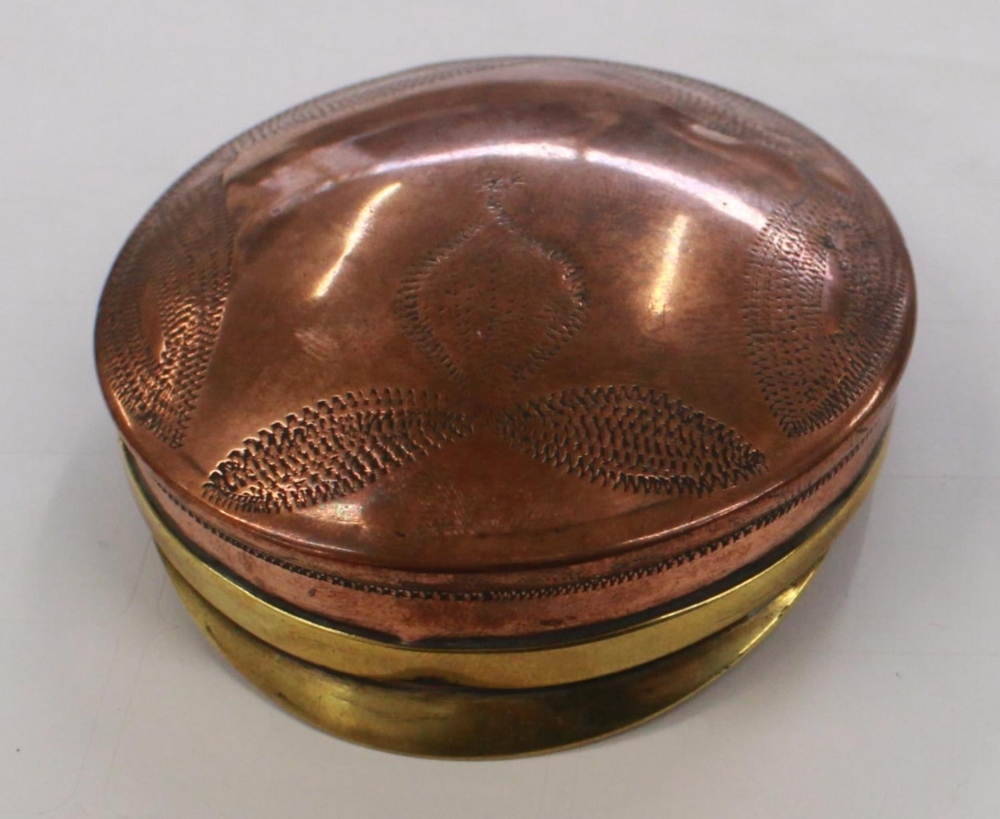 "Trench art" brass and copper snuff box in the shape of a infantry mans cap
