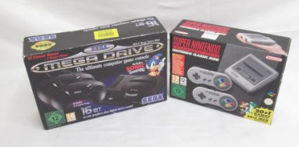 Super Nintendo Entertainment System Nintendo Classic Mini and a Sega Mega Drive Mini