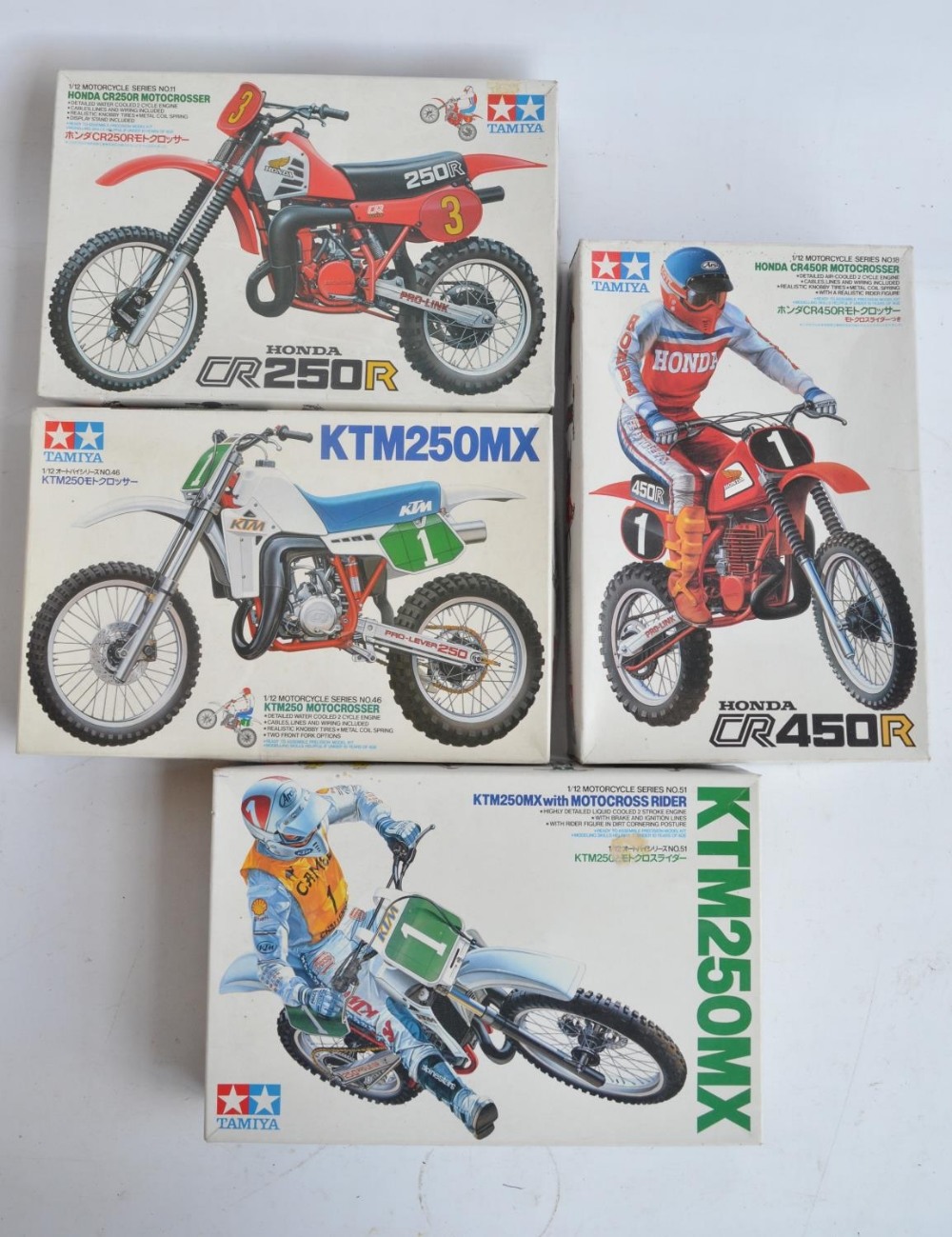 Four 1/12 scale plastic model motorcycle kits from Tamiya to include 1451 KTM250MX with motocross